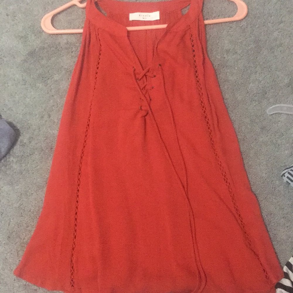 Orange tie up shirt